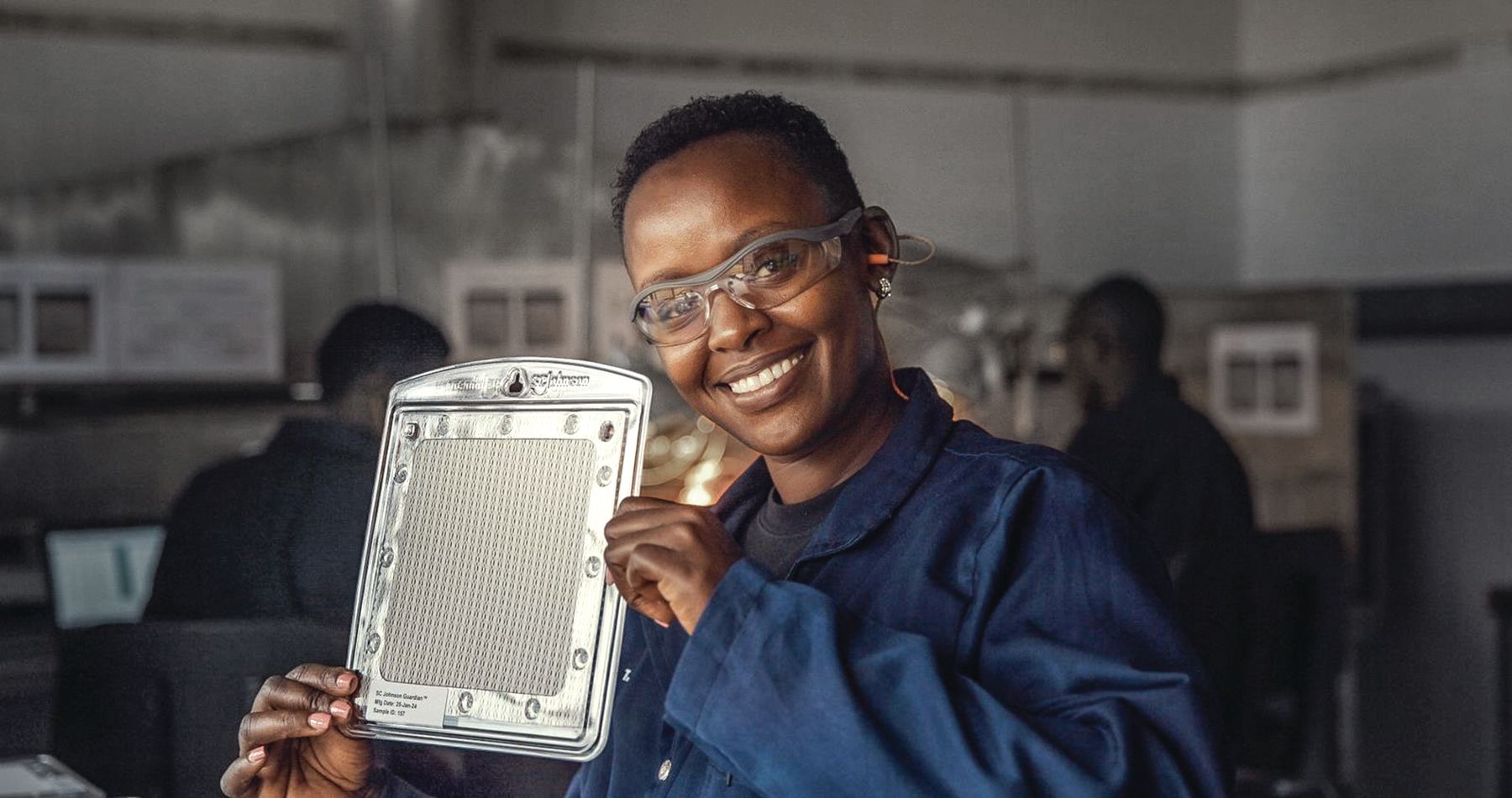 Woman holding Guardian Spatial Repellent