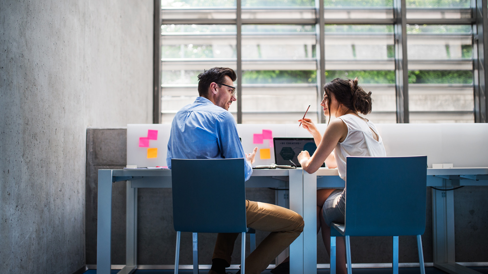 man and woman working