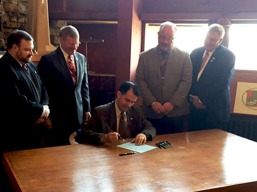 Wisconsin Governor Scott Walker signing legislation establishing the Frank Lloyd Wright Trail