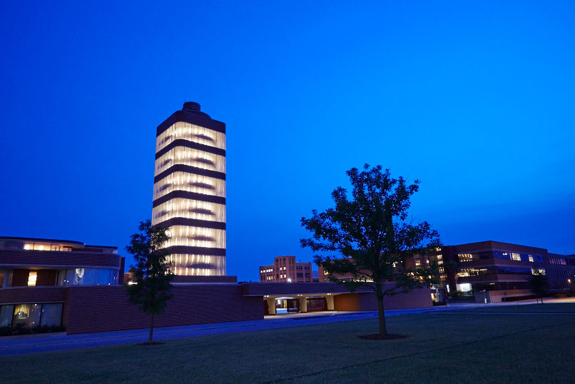 A nighttime view of the SC Johnson Research Tower designed by Frank Lloyd Wright