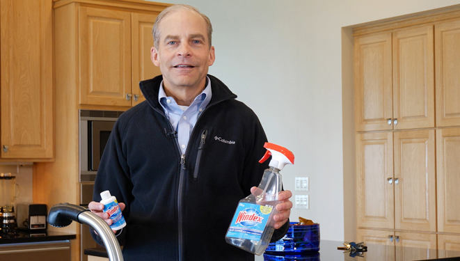fisk johnson holding windex concentrate cleaner
