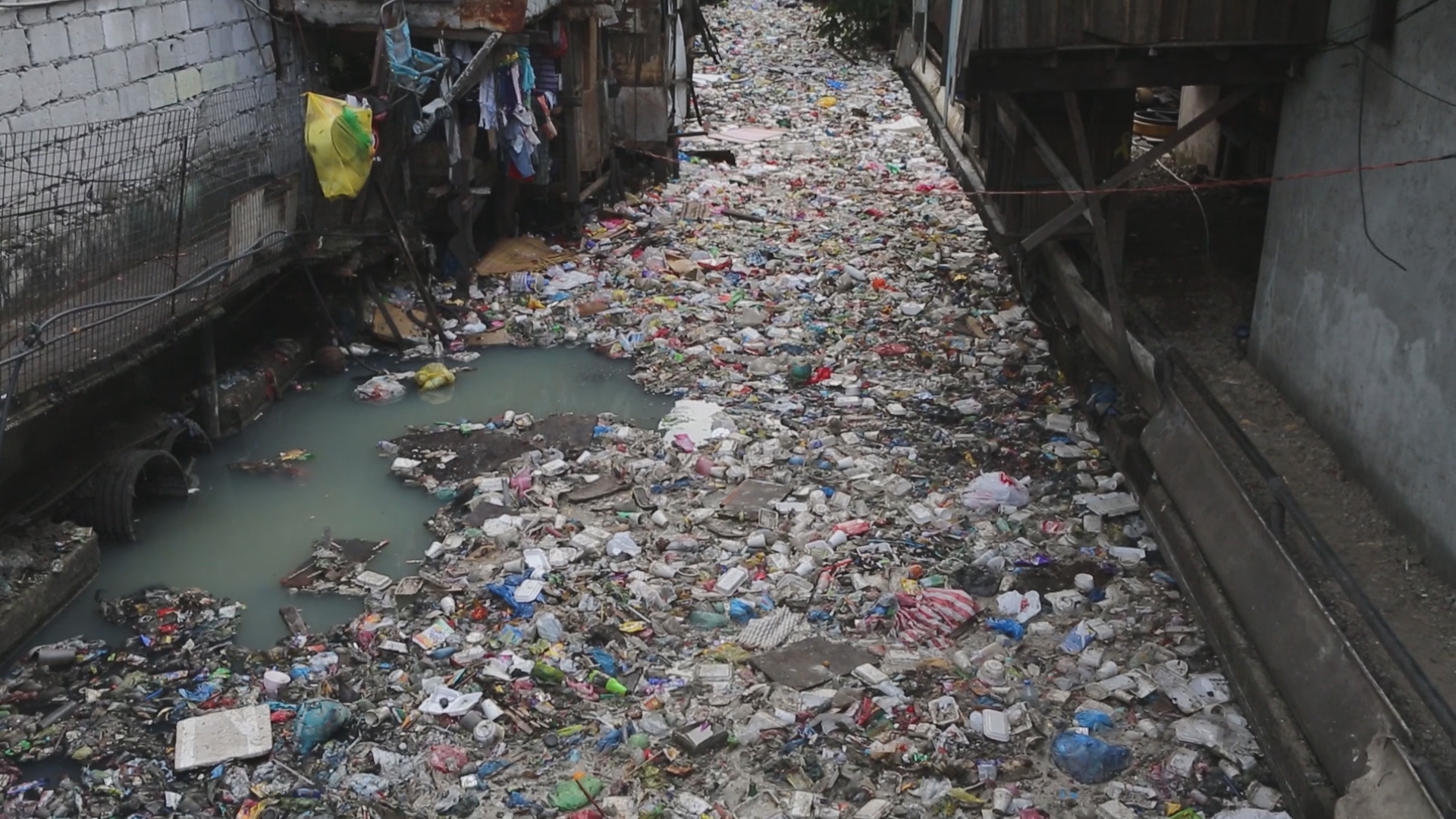garbage in a river in manila