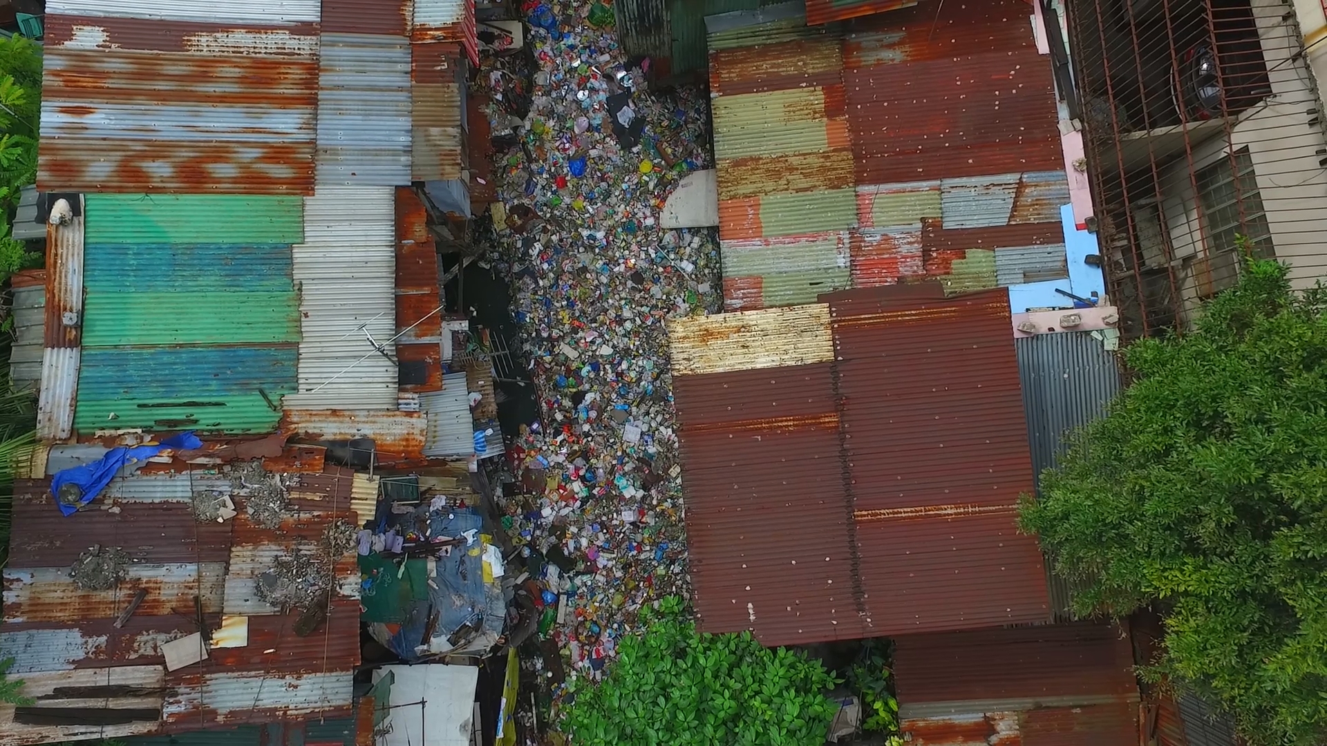 garbage completely filling a river in panama.