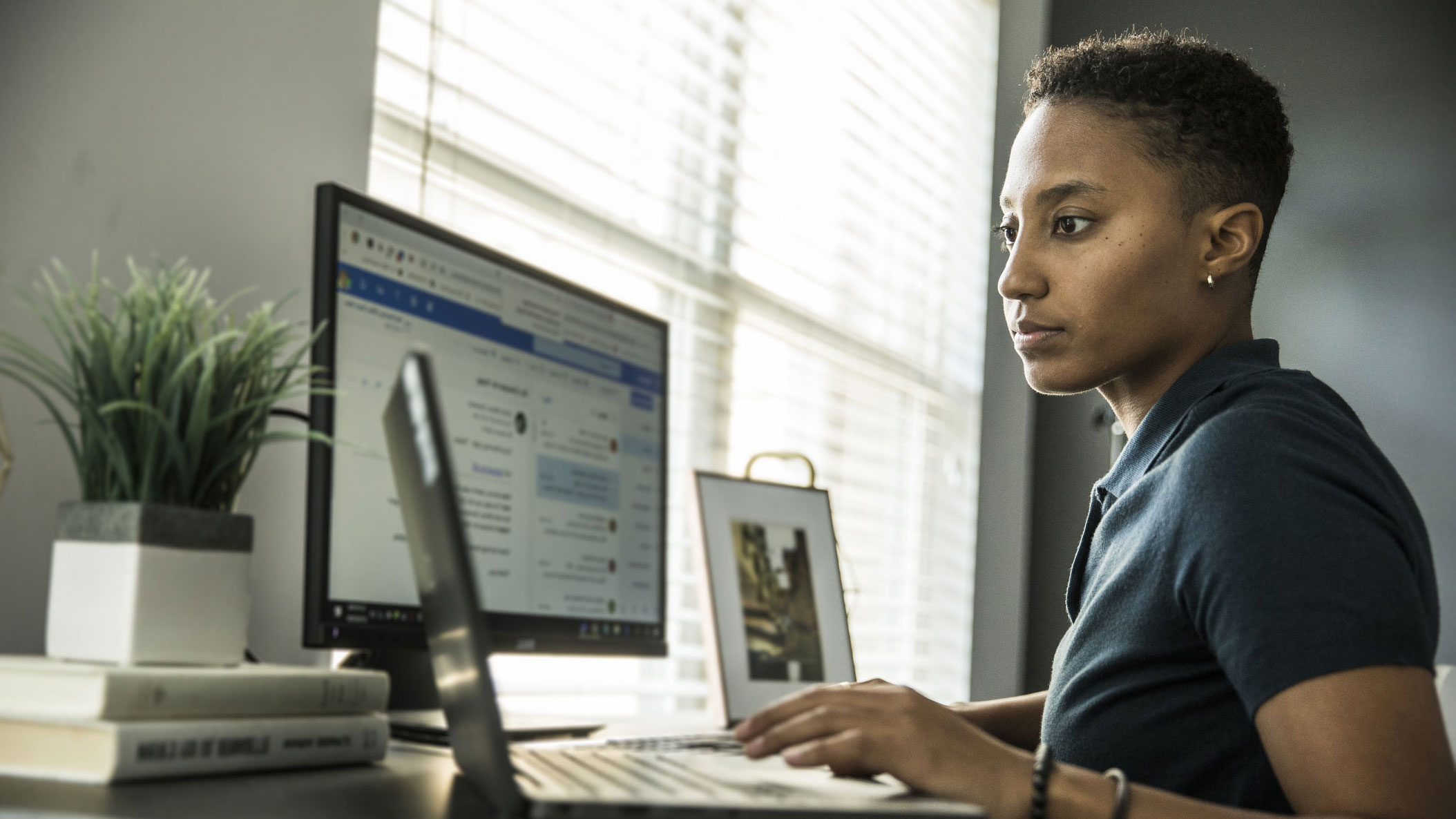 African American women working on her computer 