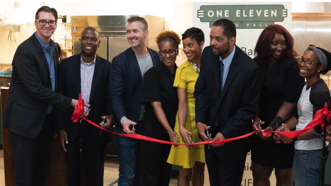 Ribbon Cutting at a small chicago business supported by the Chicago Neighborhood Initiative